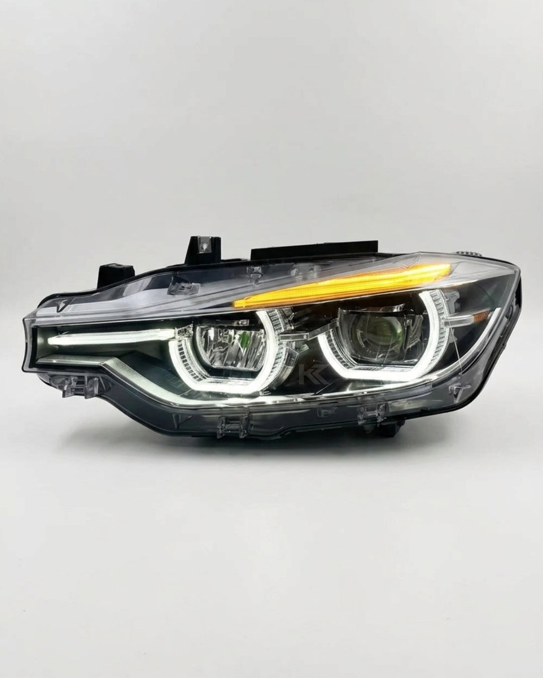 BMW 3 Series F30 LED headlight assembly by K2 Industries showing triple-color DRL, high and low beam lights, 2012-2018.