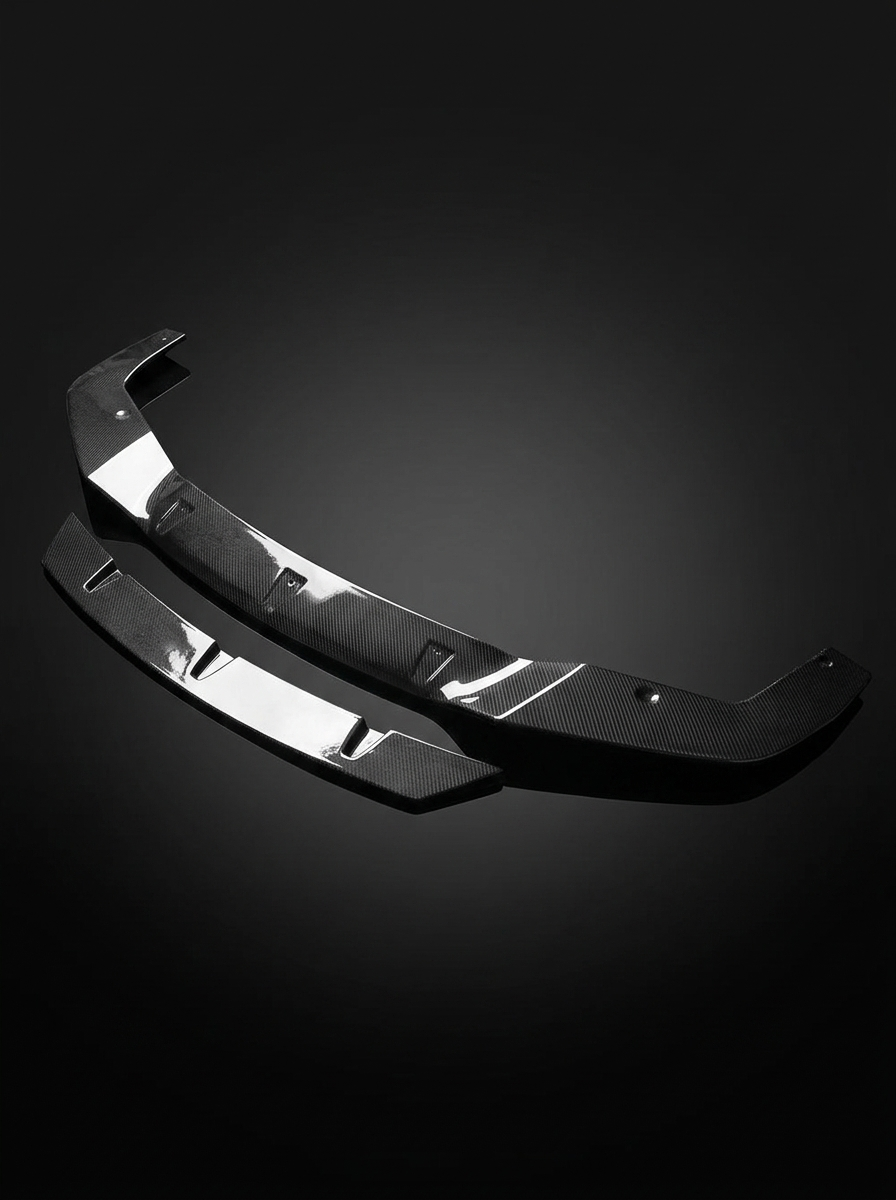 BMW 2 Series F87 M2 carbon fiber front lip by K2 Industries, showing the sleek, aerodynamic design and textured carbon fiber finish.