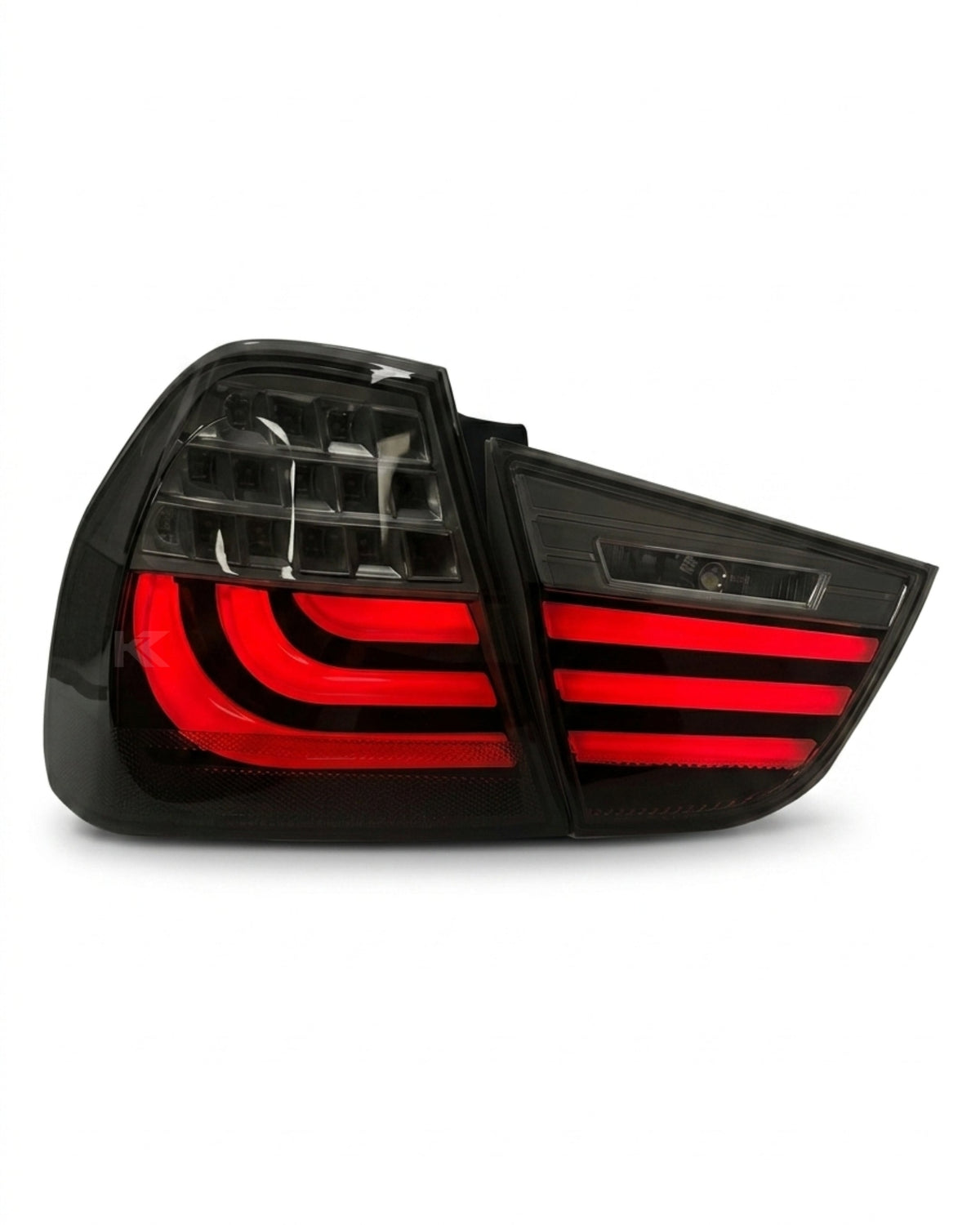 BMW 3 Series E90 upgraded LED tail light assembly by K2 Industries, showing the red and clear lens design for rear lighting.