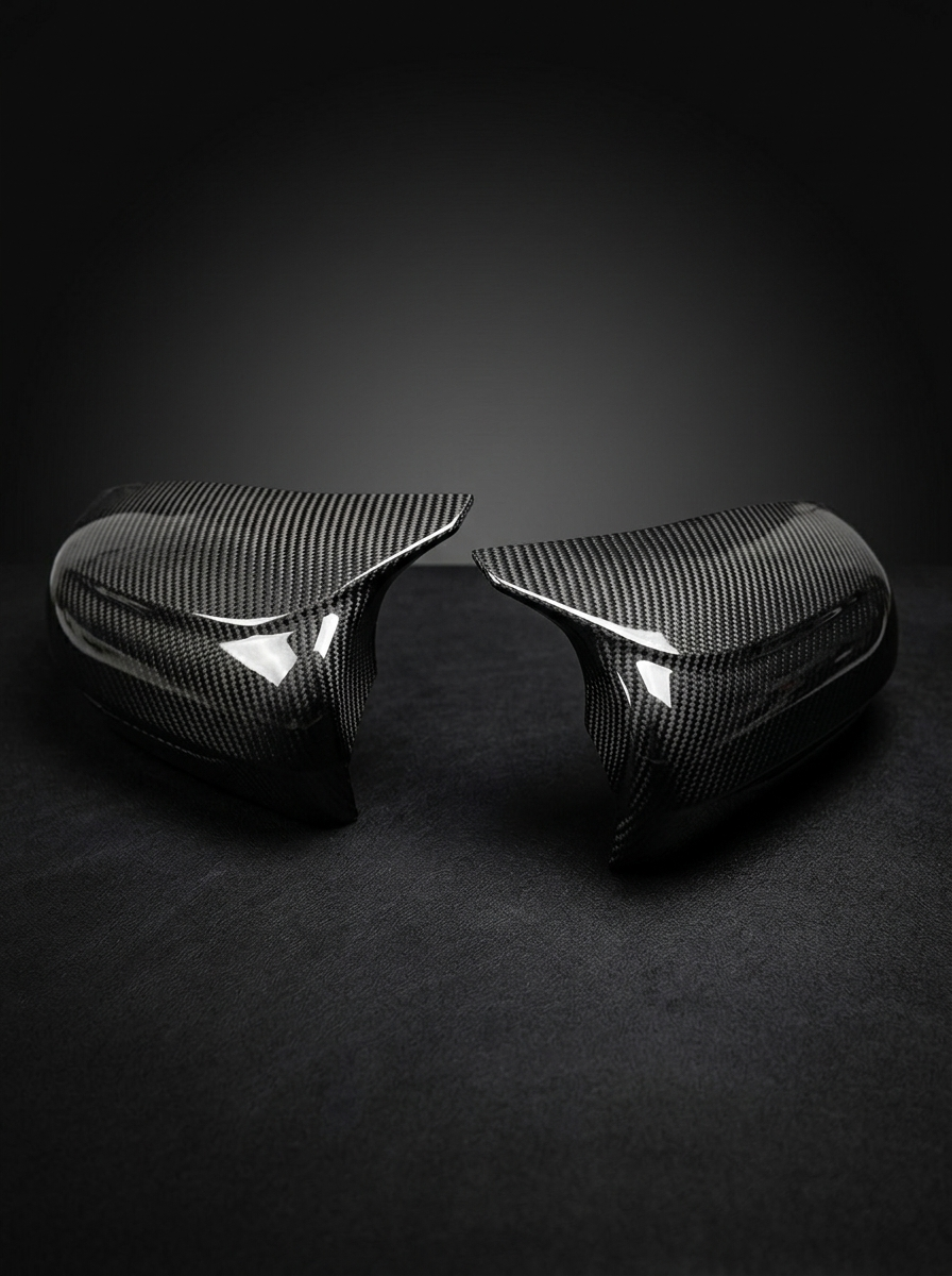 BMW 5 Series F90 M5 carbon fiber side mirror cover by K2 Industries, sleek and lightweight with a glossy finish.