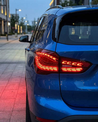 BMW X1 GTS Dragon Scale LED Tail Lights by K2 Industries, showing sleek tail light design with dragon scale pattern, installed on vehicle.