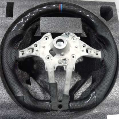 Vekto real carbon fiber M Sport steering wheel for BMW 5, 6, 7 Series, M5, and M8, showcasing sleek design and premium material.