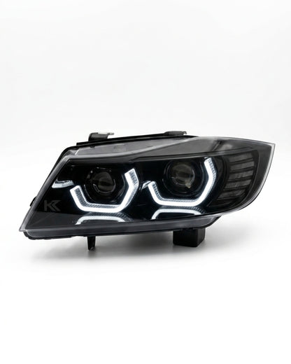 BMW 3-Series E90/E91 headlights by K2 Industries, model TRON, for 2005-2012 with clear lens and modern lighting design.