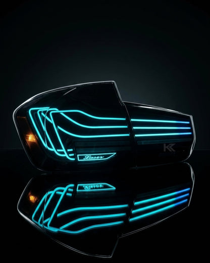 BMW 3-Series F30/F80 CSL laser style tail lights with RGB color changing, installed on the rear of a 2013-2018 vehicle.