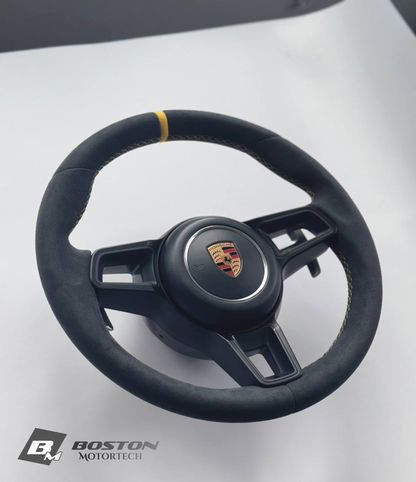 Genuine Porsche 991.2 steering wheel full set in yellow with black accents, displayed on a neutral background.