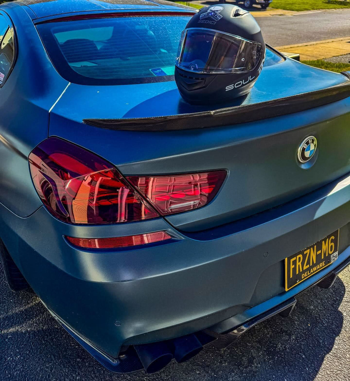 BMW 6 Series F12 F13 F06 smoke and red GTS OLED style tail lights by K2 Industries, showcasing sleek design and vibrant color accents.