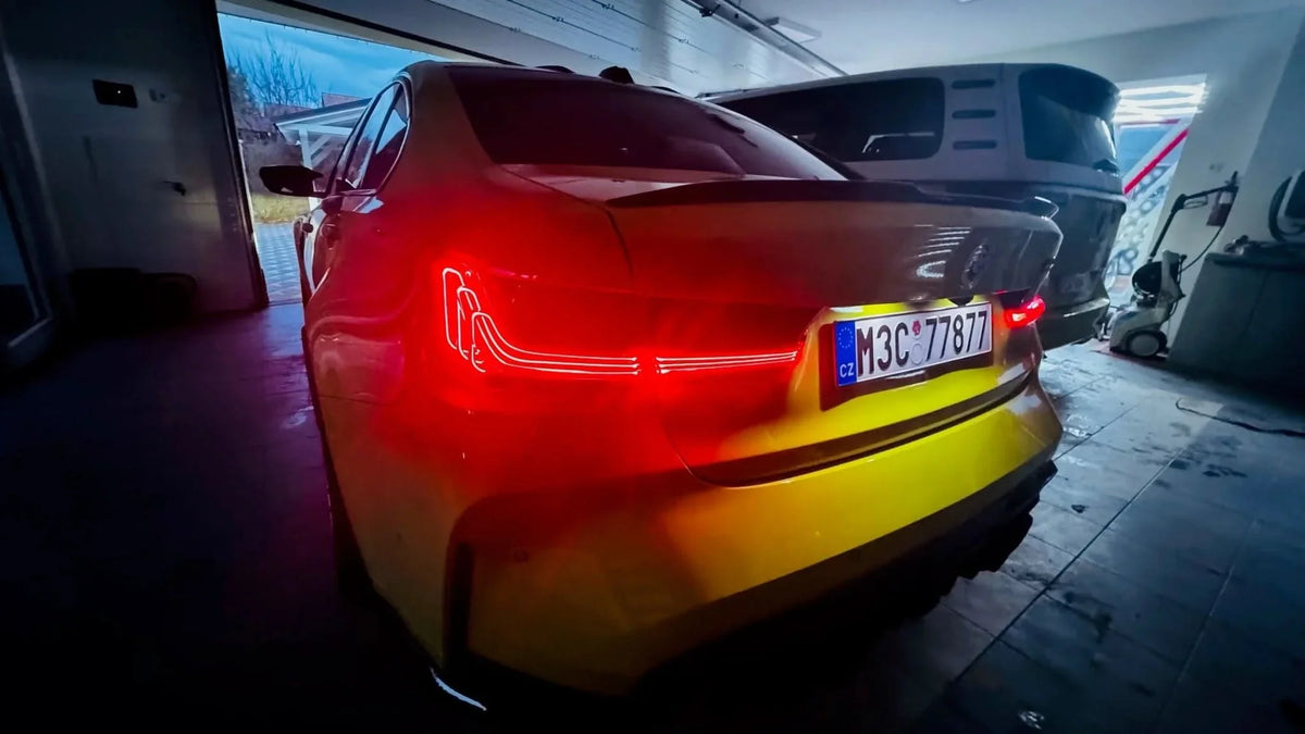BMW 3 Series G20 G28 tail lights by K2 Industries, red and smoked CSL style laser tail lights installed on a 2019-2024 model.
