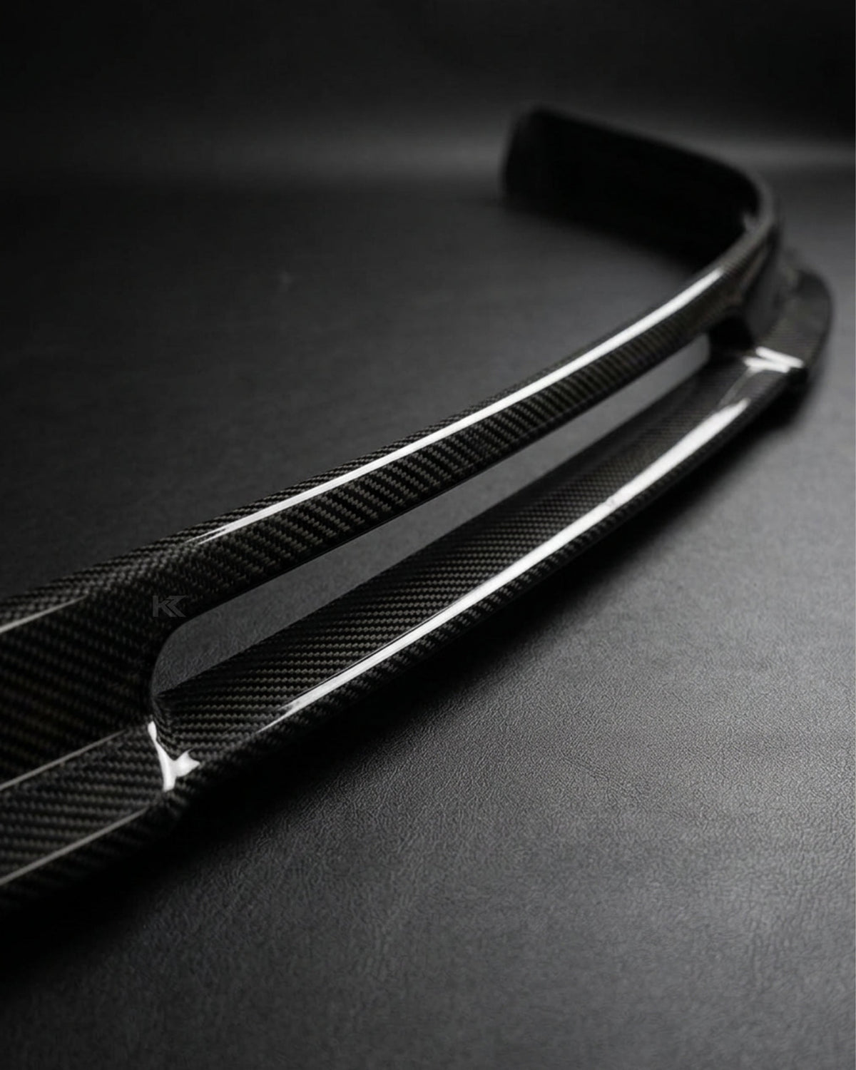 Carbon fiber front lip splitter for 2006-2009 Volkswagen Golf GTI MK5, designed as an A Style front bumper accessory by K2 Industries.