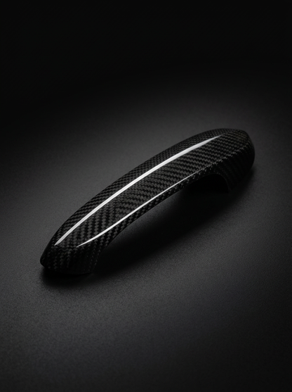 BMW 4 Series G82 M4 carbon fiber door handle cover by K2 Industries, showcasing sleek black carbon fiber surface and precise fit.