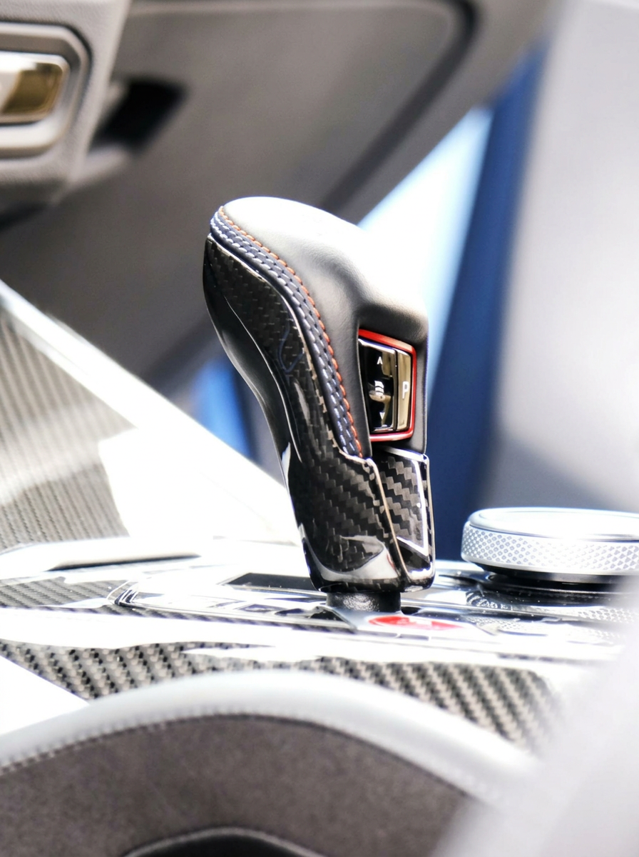 BMW 3/4 Series G80/G81/G82/G83/G87 carbon fiber gear shifter knob by K2 Industries, showcasing sleek, lightweight design.