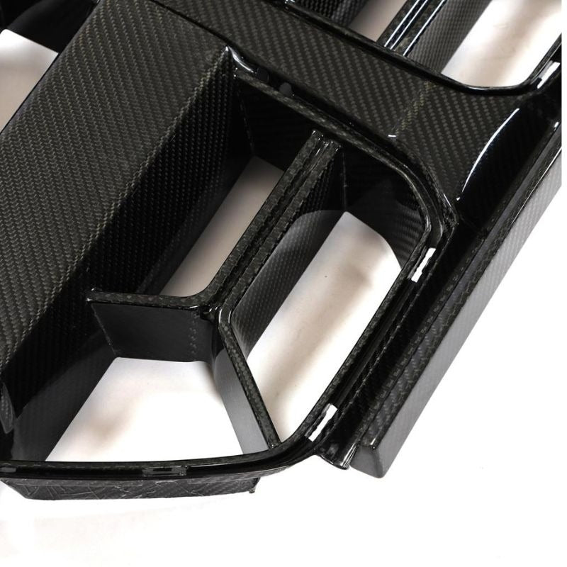 Carbon fiber kidney grille for BMW G80 M3 and G82 M4 by Palenon Performance, showing sleek, high-quality automotive grille design.