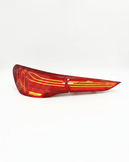 BMW 4-Series G82 M4 G22 CSL laser style tail lights by K2 Industries, showing sleek design and LED illumination.