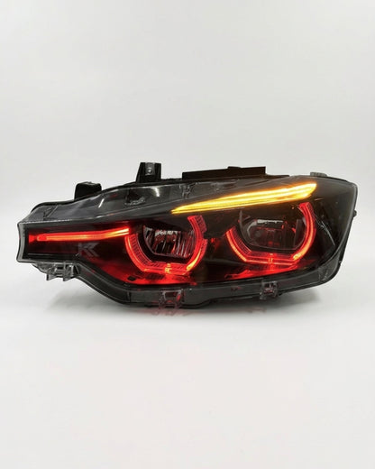 BMW 3 Series F30/F31/F35 V3 smoked triple-color LED headlight assembly with white, yellow, and red DRL from K2 Industries.
