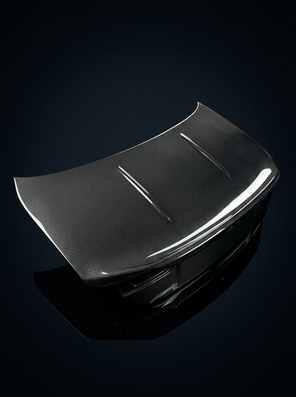 BMW 4 Series G82 Carbon Fiber CSL trunk by K2 Industries, showcasing sleek carbon fiber material and aerodynamic design.