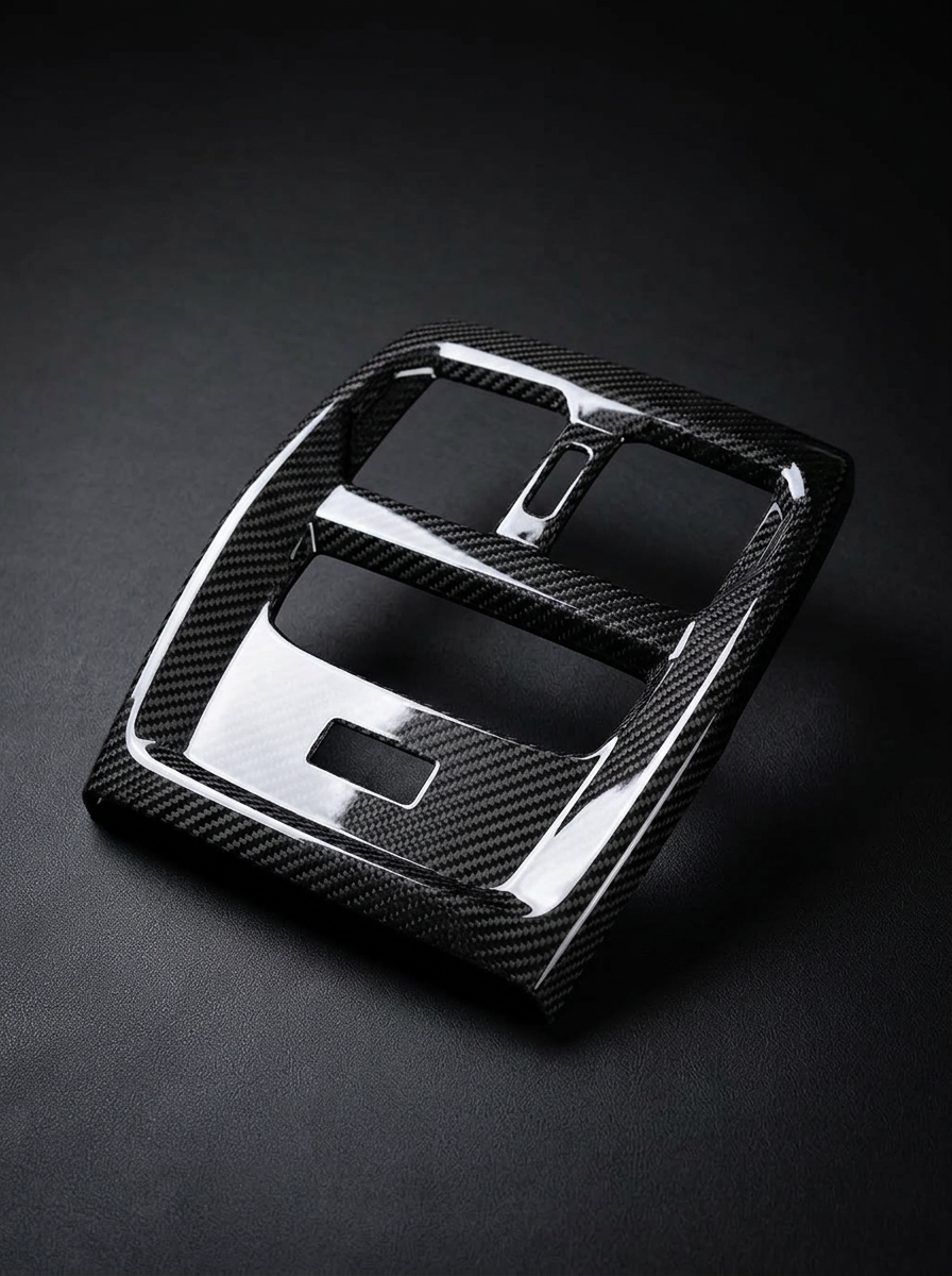 BMW 3 Series G80 G82 M3 M4 carbon fiber rear console trim by K2 Industries, showing sleek, textured interior automotive accessory.