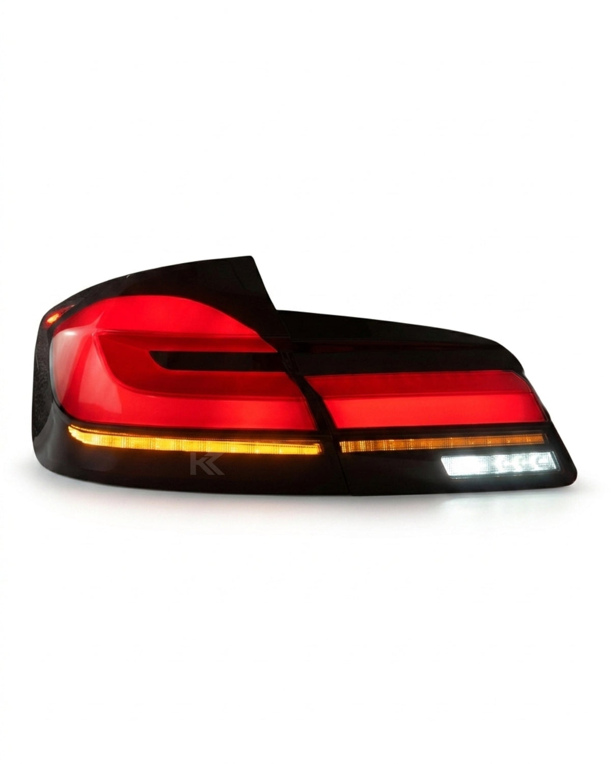 BMW 5-Series F10 F18 tail lights in clear G30 style by K2 Industries, shown installed on the vehicle from 2011 to 2017