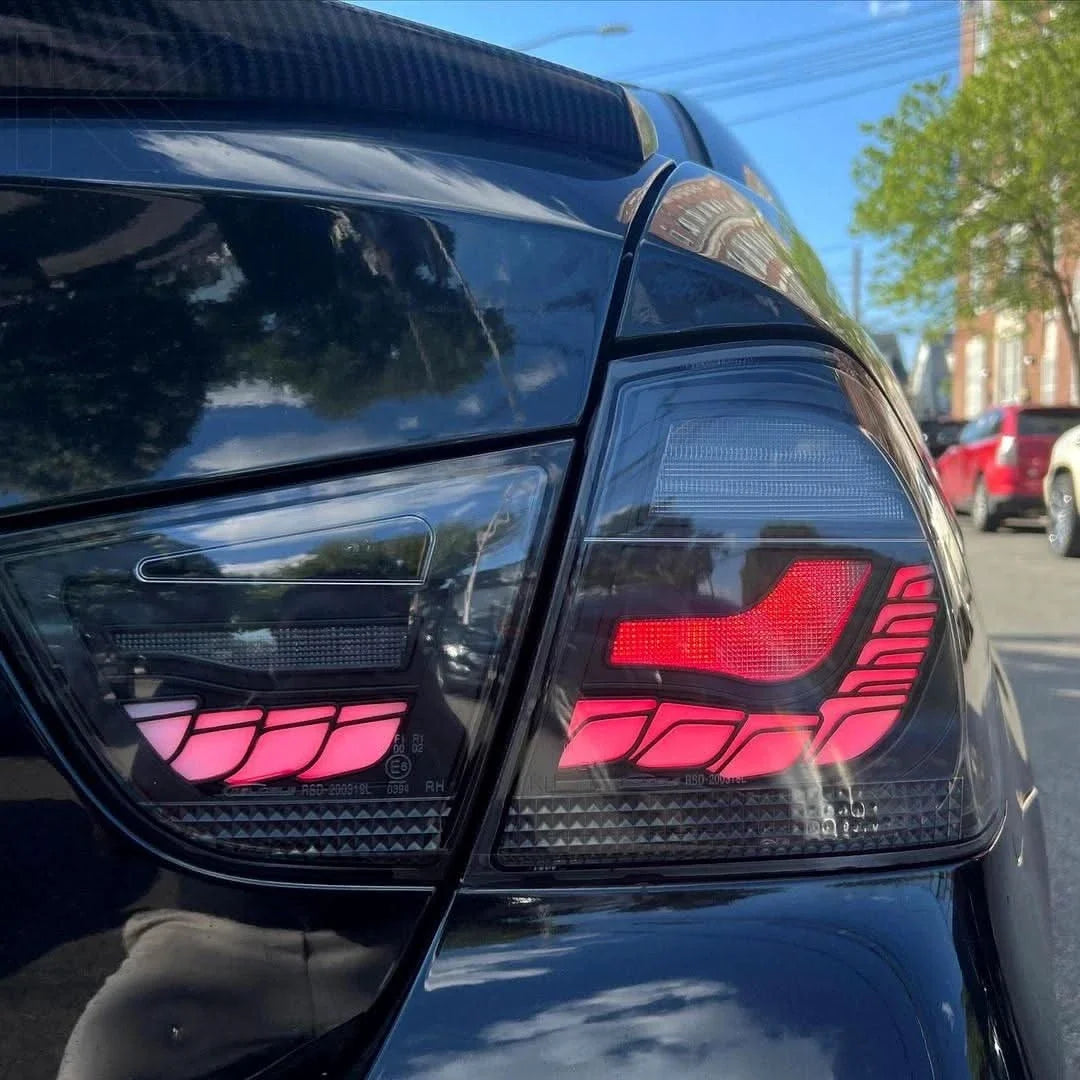 BMW 3 Series E90 M3 GTS OLED tail lights by K2 Industries, showcasing sleek, modern LED tail light design for model years 2006-2011.