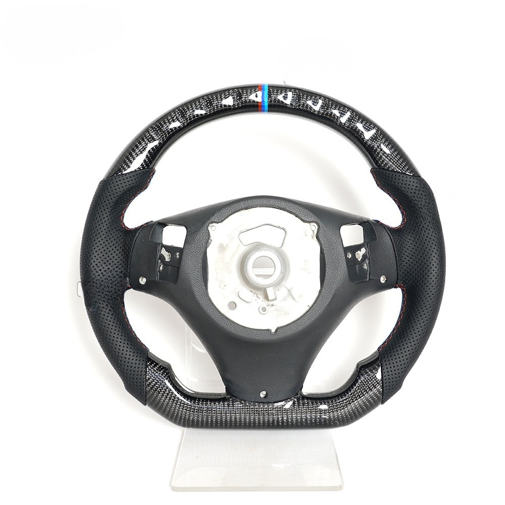 Vekto real carbon fiber steering wheel for BMW E90 E92 E93 M3 328i 335i 135i 2007-2013, showing detailed carbon fiber surface