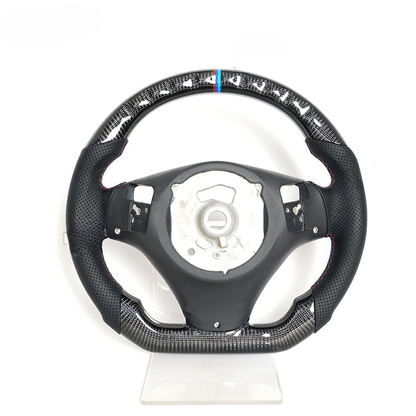 Vekto real carbon fiber steering wheel for BMW E90 E92 E93 M3 328i 335i 135i 2007-2013, showing detailed carbon fiber surface
