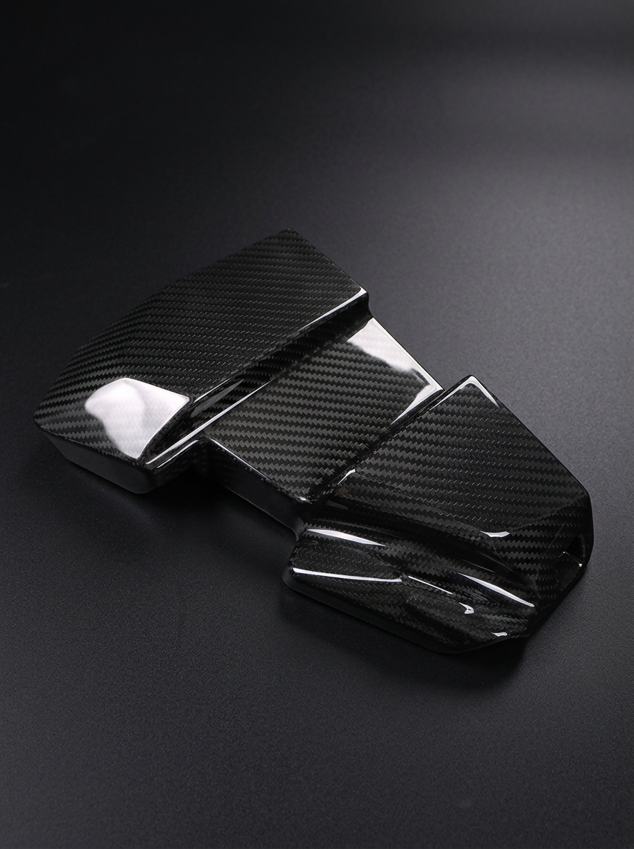 BMW 3/4 Series G80/G81/G82/G83/G87 carbon fiber ECU cover by K2 Industries, showcasing sleek, textured carbon fiber design.