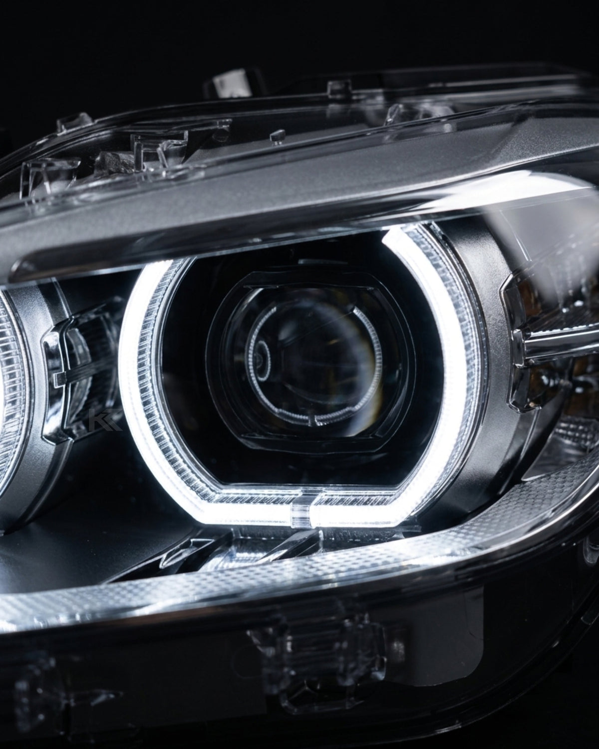 BMW 1 Series F20 118i dual-color LED headlight assembly with high and low beam from K2 Industries, yellow and white finish.