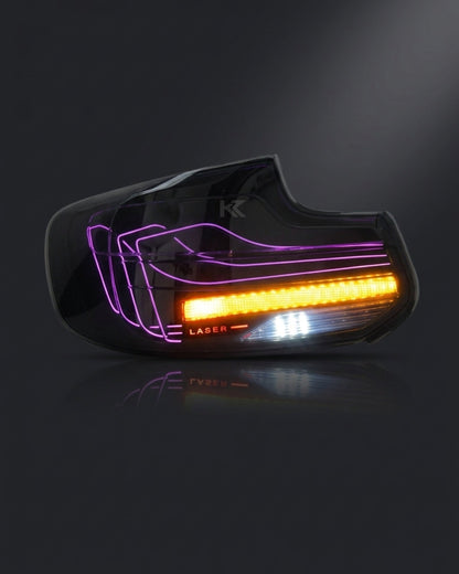 BMW 2 Series F22 F87 CSL RGB LED tail light assembly with turn signal, black housing, for 2014-2021 models by K2 Industries.