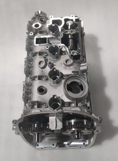 Bayern Automotive DAS MOTOR HAUS EA888 Gen 2 engine reconditioning kit with various engine components laid out on a surface.