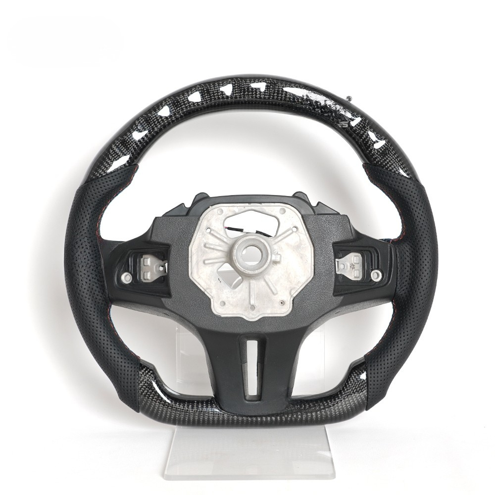 Vekto M Sport carbon fiber steering wheel for BMW G Series with sporty design and textured grip details visible.