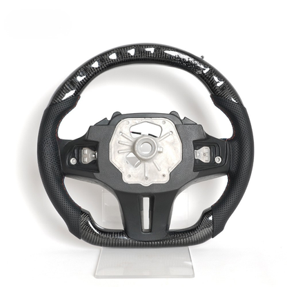 Vekto M Sport carbon fiber steering wheel for BMW G Series with sporty design and textured grip details visible.