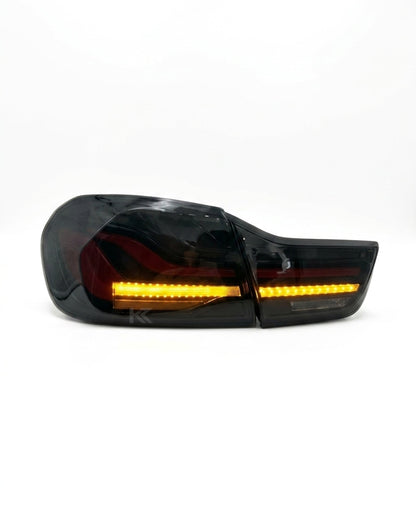 BMW 4-Series F32 F82 430i CSL Style LED tail lights by K2 Industries, installed on a 2013-2018 vehicle, showing bright LED design.