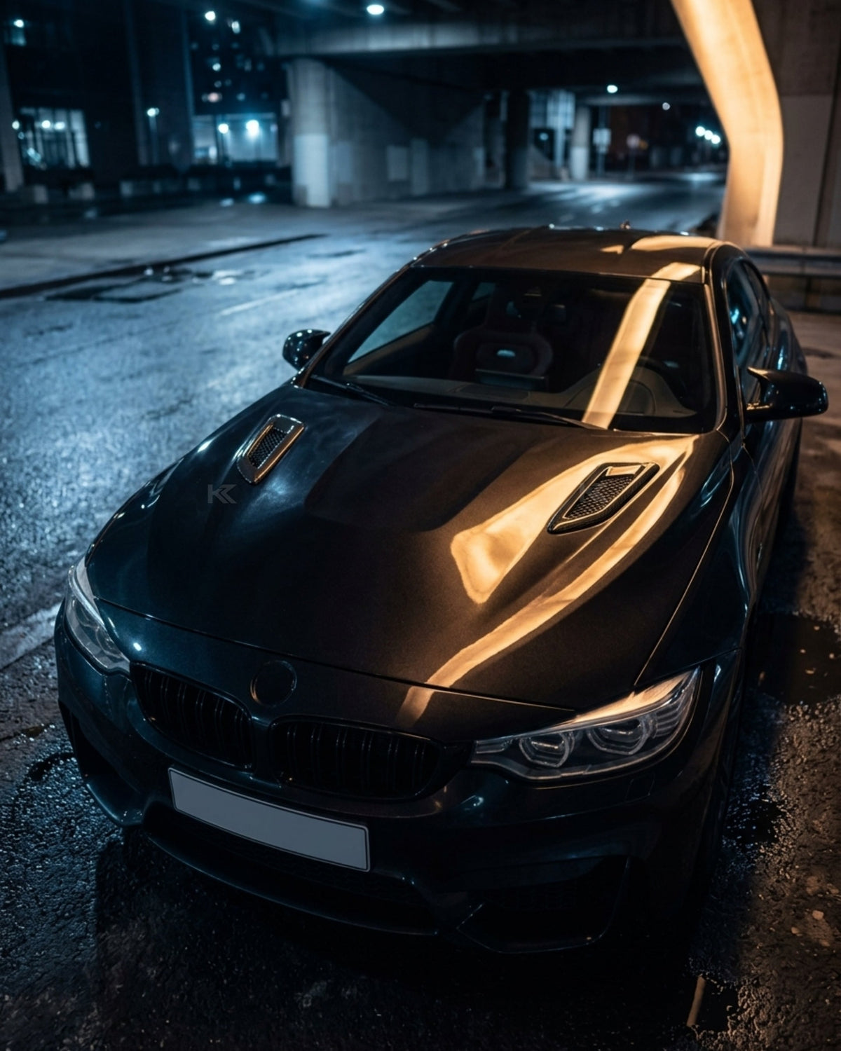 BMW F80 M3, F82 M4, F87 M2, F90 M5, G30 carbon fiber hood vents by K2 Industries, showing sleek vent design on car hood.