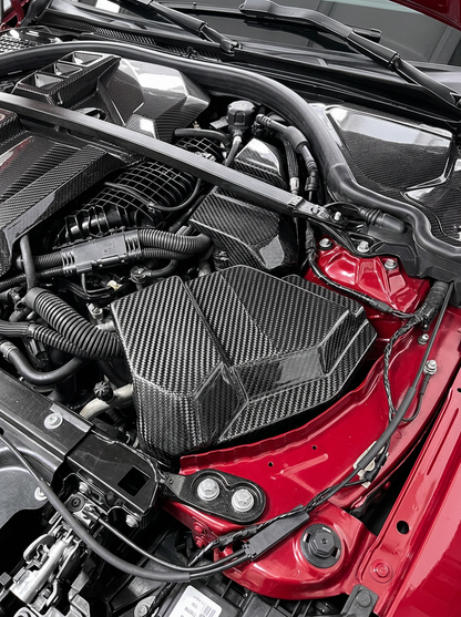 BMW 3/4 Series G80 G81 G82 G83 G87 carbon fiber ECU cover by K2 Industries, showing sleek black textured finish on engine compartment.