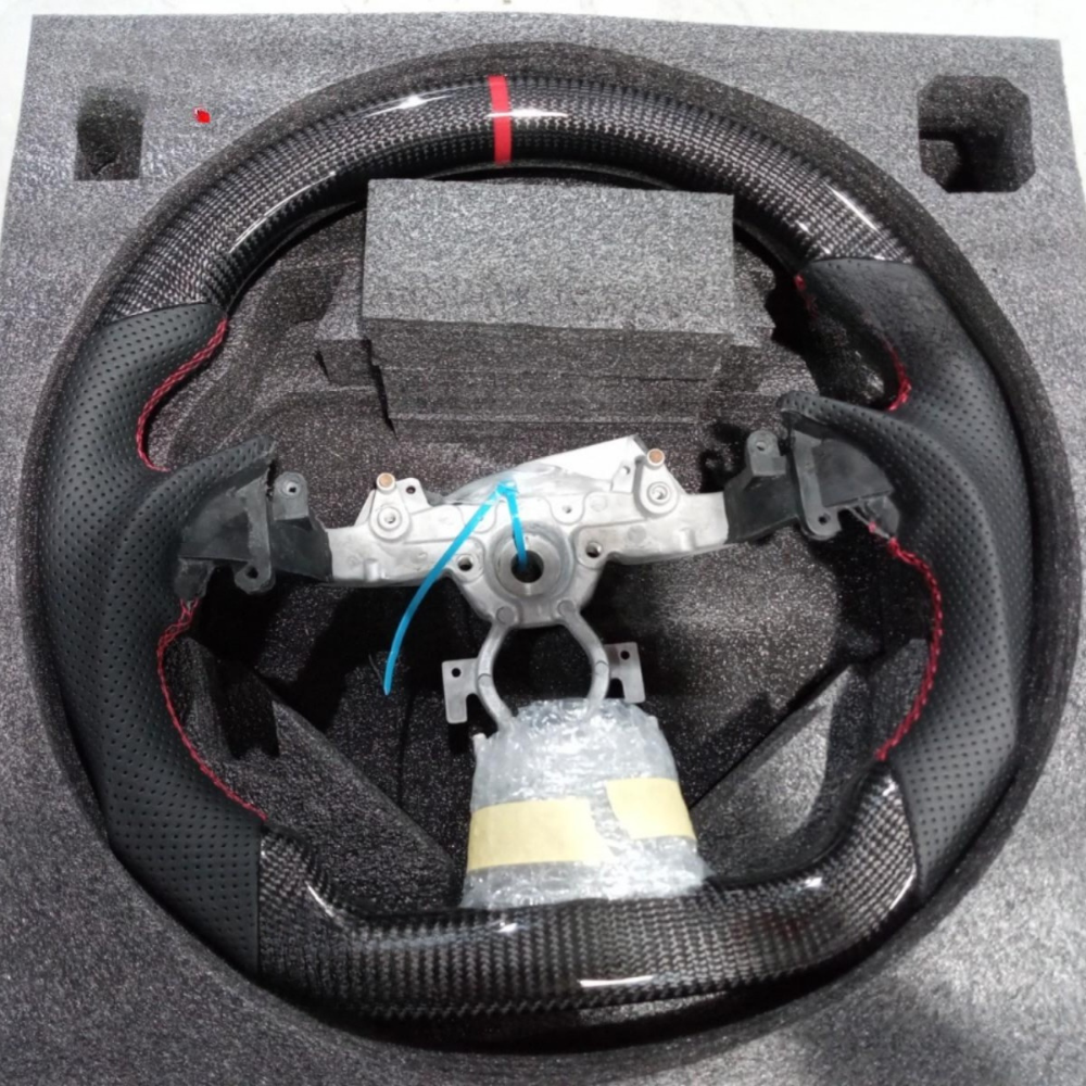 Vekto premium full leather steering wheel for BMW 3 Series E90, E91, E92, E93, and M3 models, showing close-up of leather grip and wheel details.