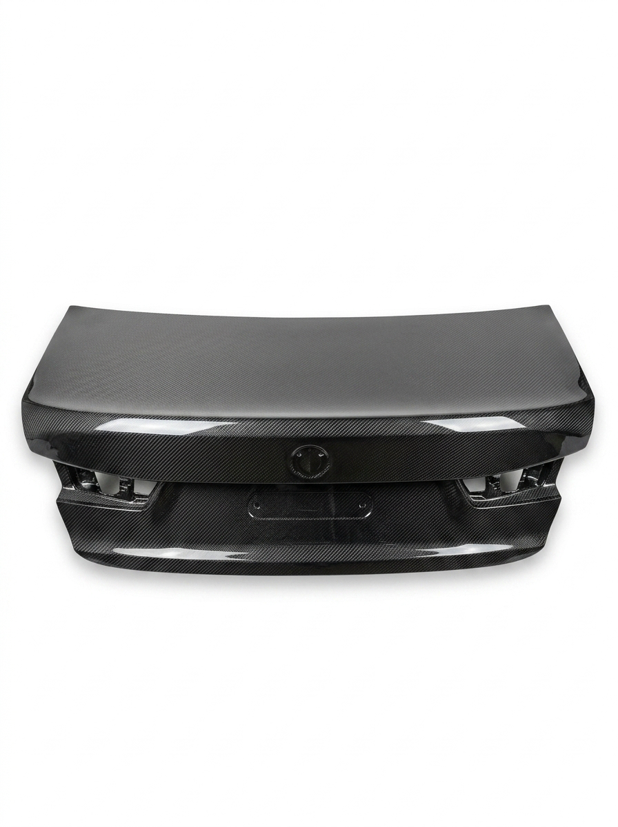 BMW 3 Series G80 M3 OEM Style carbon fiber trunk by K2 Industries, showing sleek, lightweight, textured carbon fiber surface.