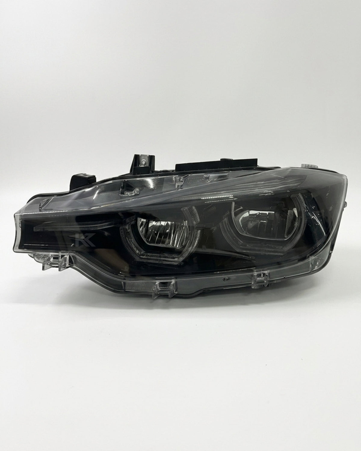 BMW 3 Series F30 F31 F35 V3 smoked triple-color LED headlight assembly with white, yellow, and red DRL by K2 Industries.