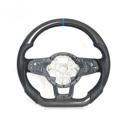 Vekto carbon fiber steering wheel for VW Golf 7 GTI R Mk7, close-up of sporty, textured steering wheel with carbon fiber finish.