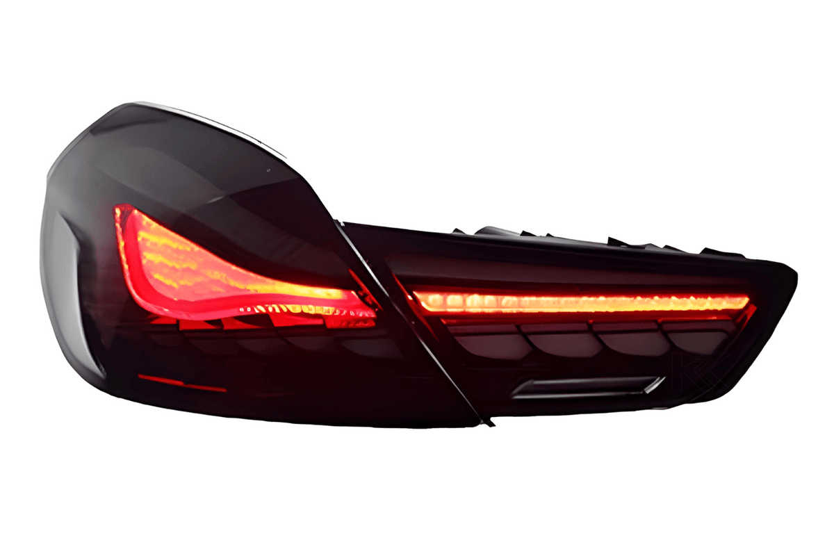 BMW 6 Series F12 F13 F06 smoke and red GTS OLED style tail lights by K2 Industries, showing sleek design and LED accents.
