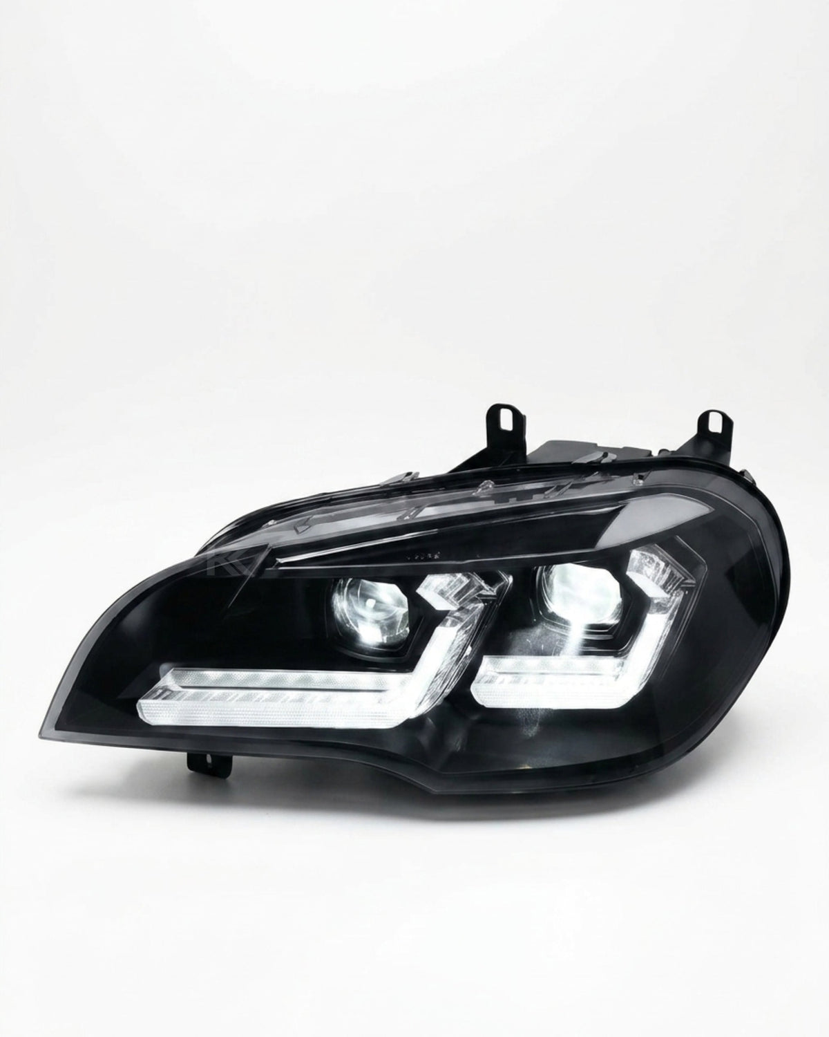 BMW X5 E70 "TRON" LED headlights by K2 Industries, showing sleek headlight assembly for 2007-2013 model years.