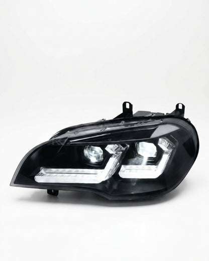 BMW X5 E70 "TRON" LED headlights by K2 Industries, showing sleek headlight assembly for 2007-2013 model years.