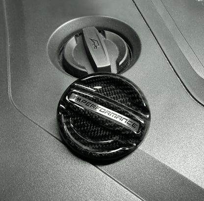 BMW MPerformance carbon fiber engine oil cover by K2 Industries, showcasing a sleek, lightweight carbon fiber engine oil cap.