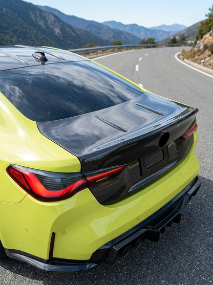 BMW 4 Series G82 carbon fiber CSL trunk by K2 Industries, showcasing lightweight, aerodynamic design with a glossy finish.