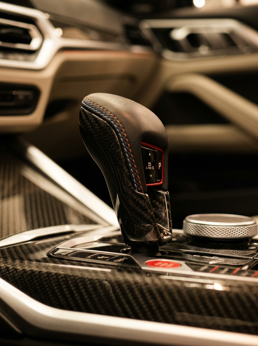 BMW 3/4 Series G80/G81/G82/G83/G87 carbon fiber gear shifter knob by K2 Industries, sleek and textured for a sporty interior upgrade