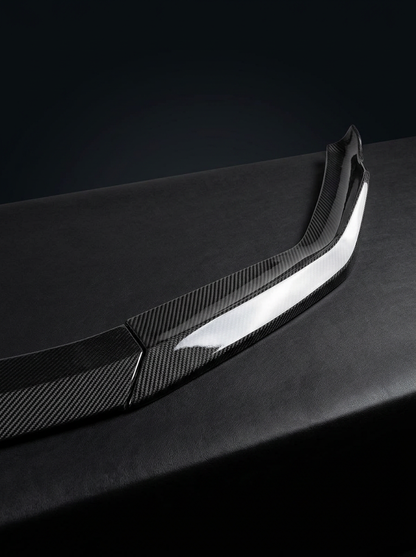 BMW 5 Series F90 M5 LCI CS Style carbon fiber front lip by K2 Industries, showcasing sleek aerodynamic design for 2021+ models.