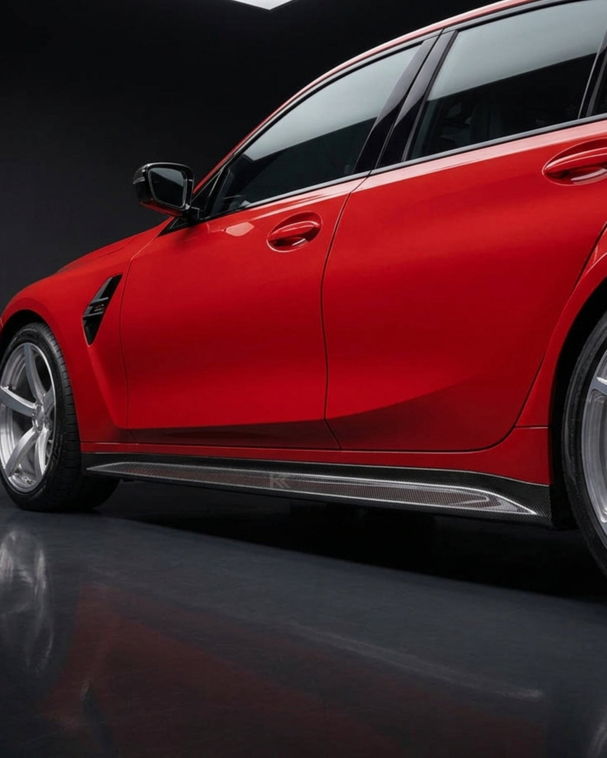 BMW M3 G80 Competition side skirts in pre-preg dry carbon fiber by K2 Industries, shown installed on the vehicle.