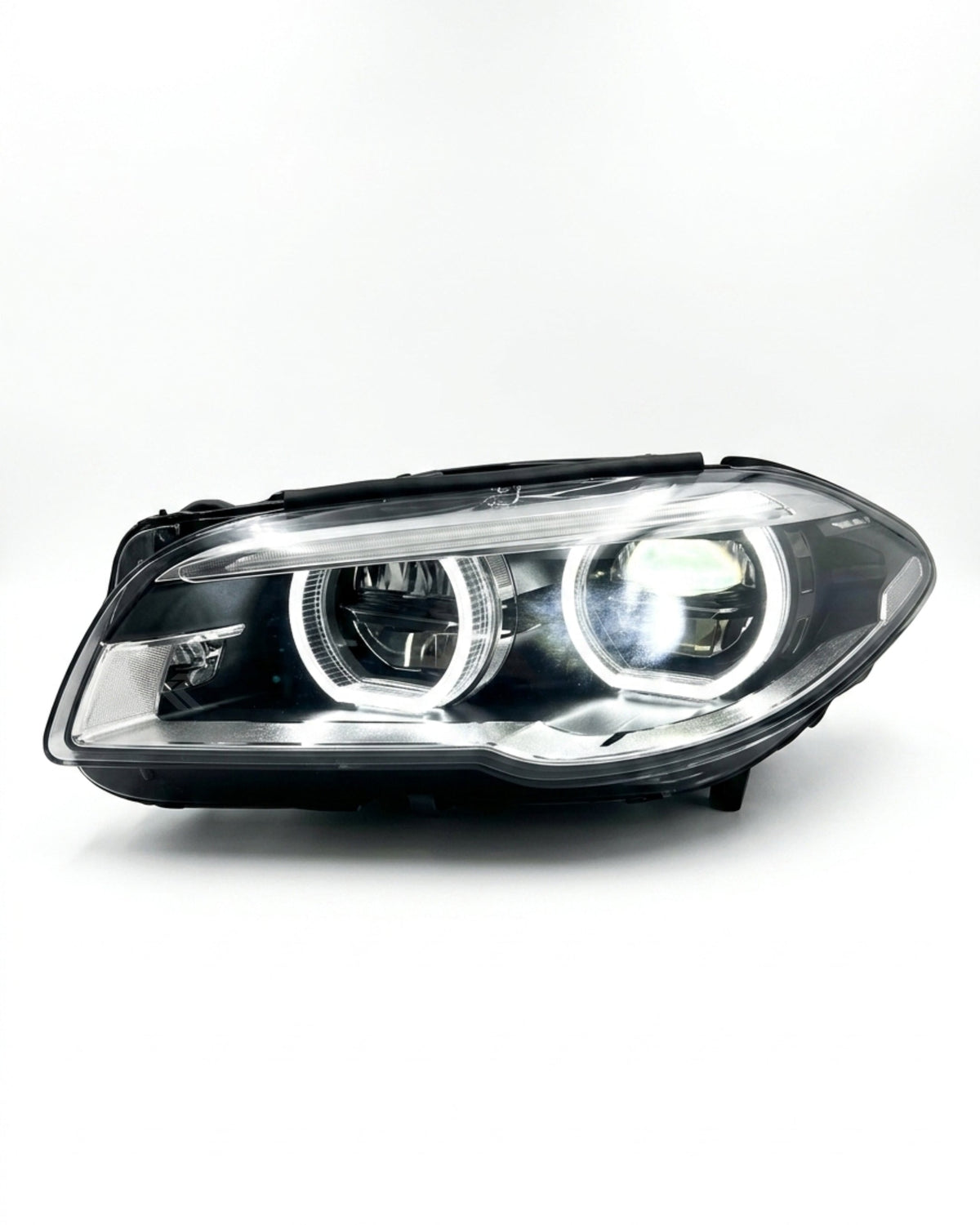 BMW 5 Series F10/F11/F18 factory style LED headlights by K2 Industries, showing the sleek headlight design and LED light modules.