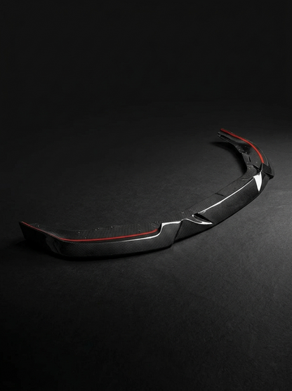 BMW 2 Series G87 M2 carbon fiber front lip by K2 Industries, showcasing sleek, aerodynamic design on a 2023 model.