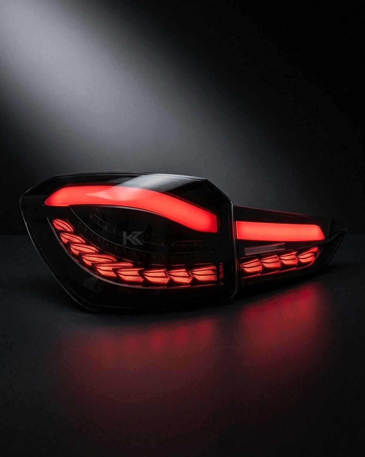 BMW X1 GTS Dragon Scale LED tail lights by K2 Industries, showcasing sleek, illuminated tail light design for 2016-2021 models.