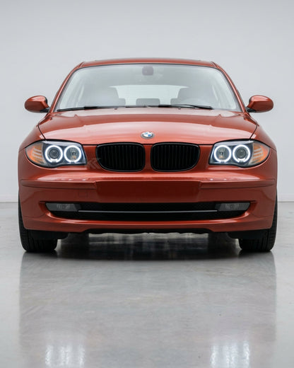 K2 Industries LED headlights with angel eyes for BMW 1 Series E87 120i 118i (2005-2011), showcasing sleek headlight design.