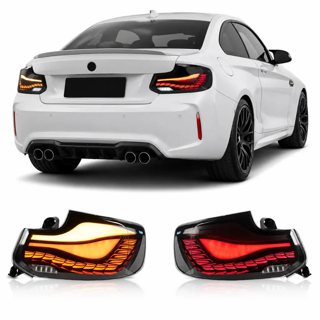 Vekto GTS Dragon Scale LED taillights installed on a BMW 2 Series F22/F23 and M2 F87, showcasing sleek red and clear lens design