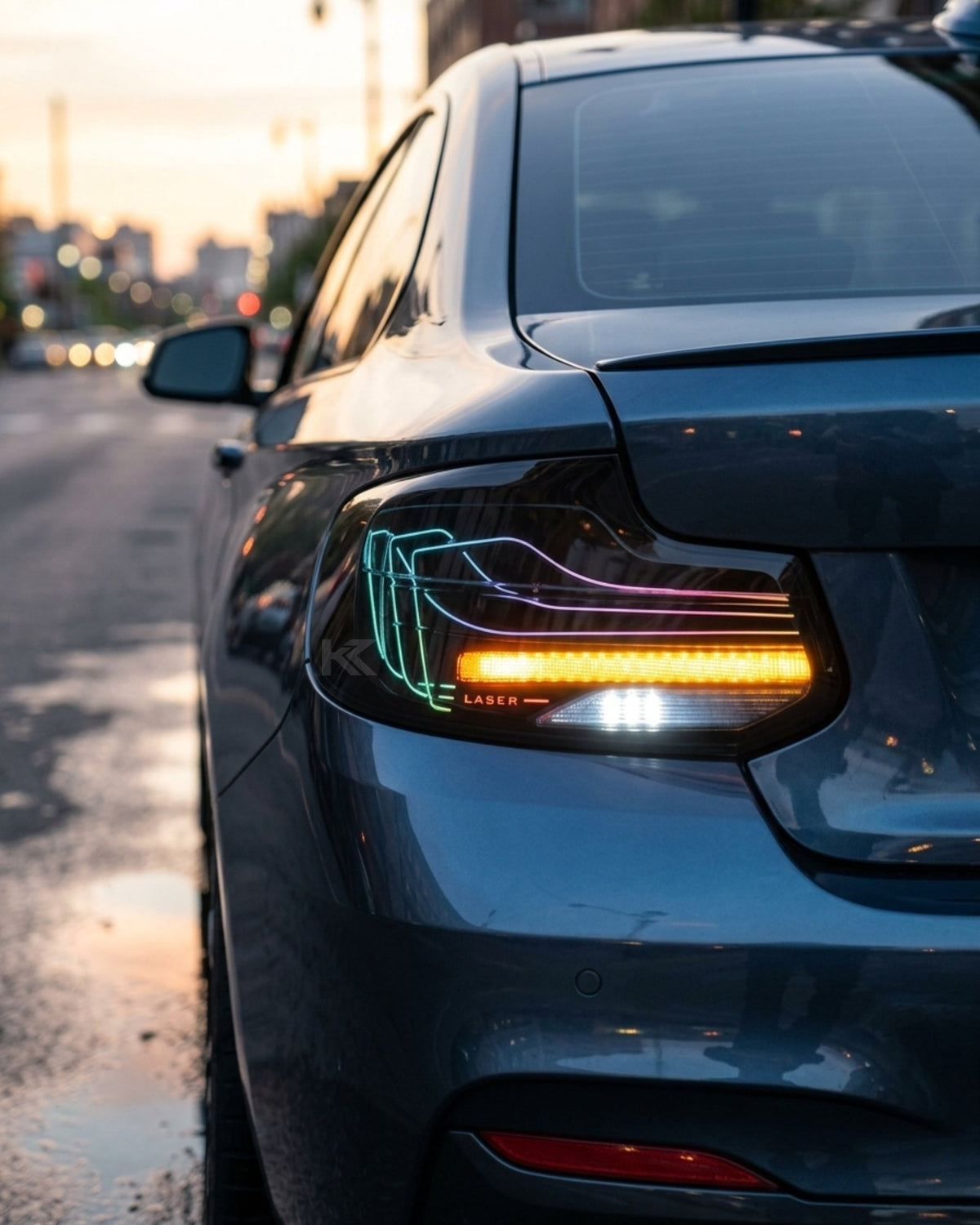 BMW 2 Series F22 F87 CSL RGB LED tail light assembly with turn signal by K2 Industries, featuring vibrant red and RGB lighting.